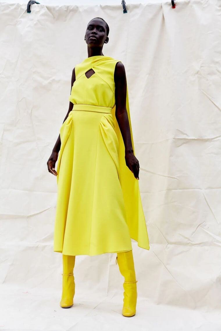 28. Yellow summer dress with a cutout part in front