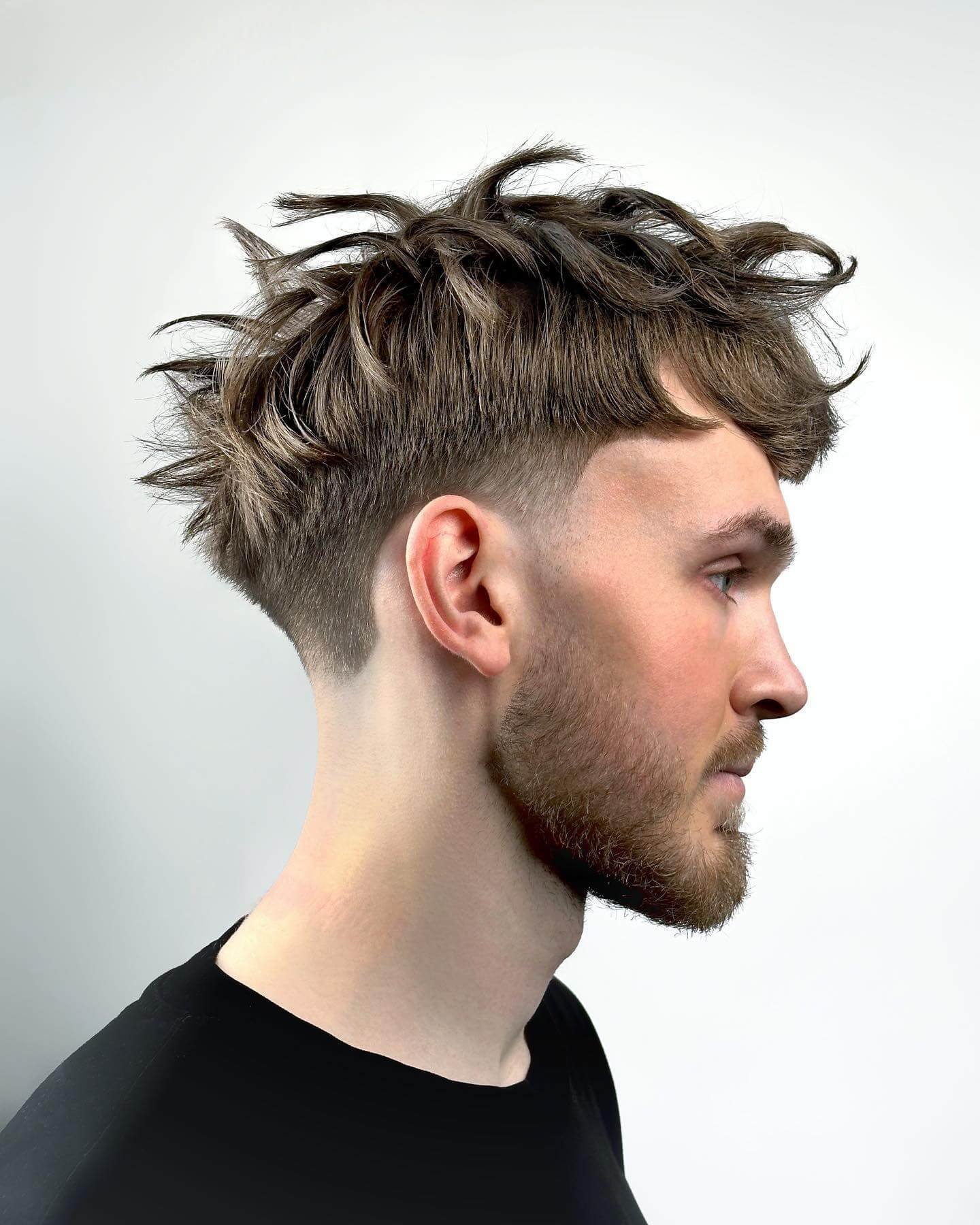 Tousled quiff men's hairstyles for thin hair
