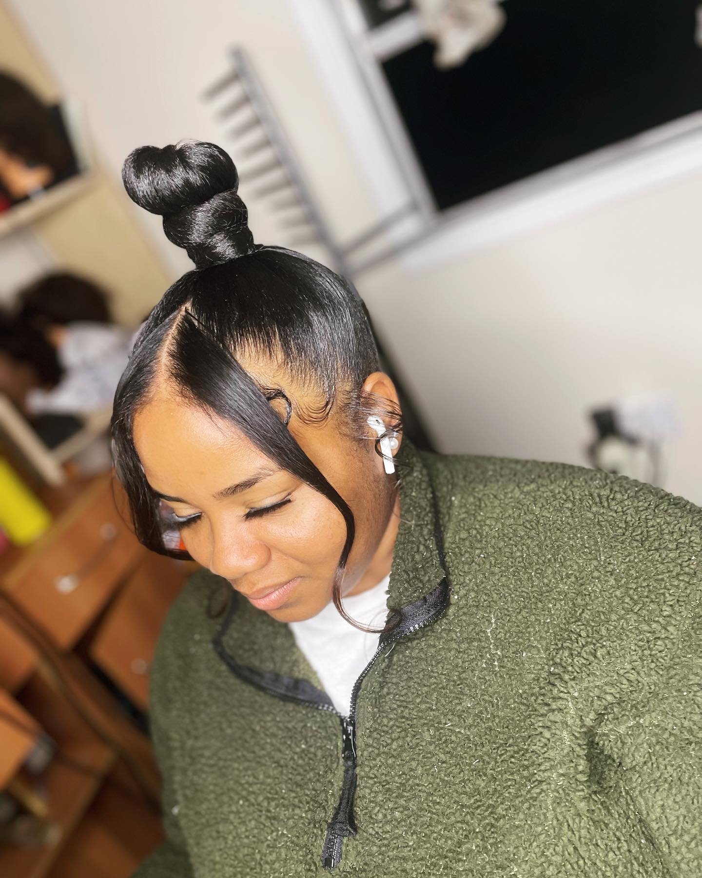 High Bun With Bangs