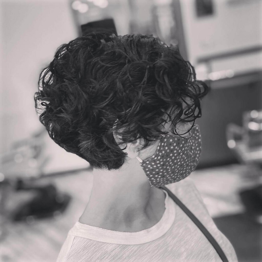 Textured pixie cut with v-shaped bangs
